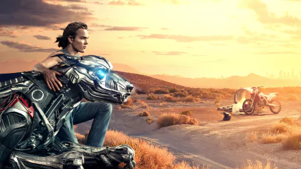 8K Ultra HD PC desktop wallpaper from the movie A.X.L.: a teen sits with a metallic robotic dog on a desert road at sunset, a motorcycle parked in the distance.
