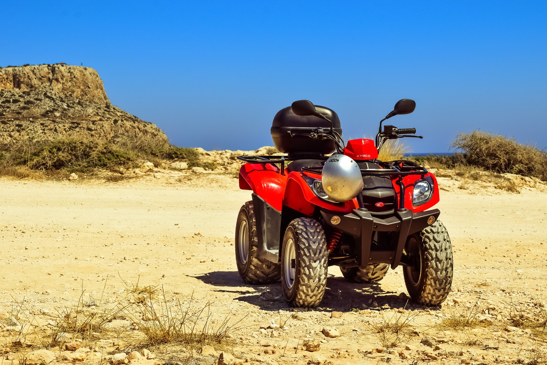 Red KYMCO ATV/Quad (Dune Buggy) by Dimitris Vetsikas