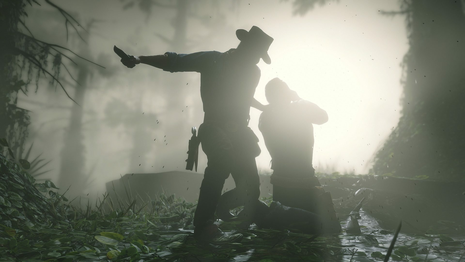 Silhouetted gunslinger threatens a kneeling man in a foggy swamp — Red Dead Redemption 2 video game HD PC desktop wallpaper/background.