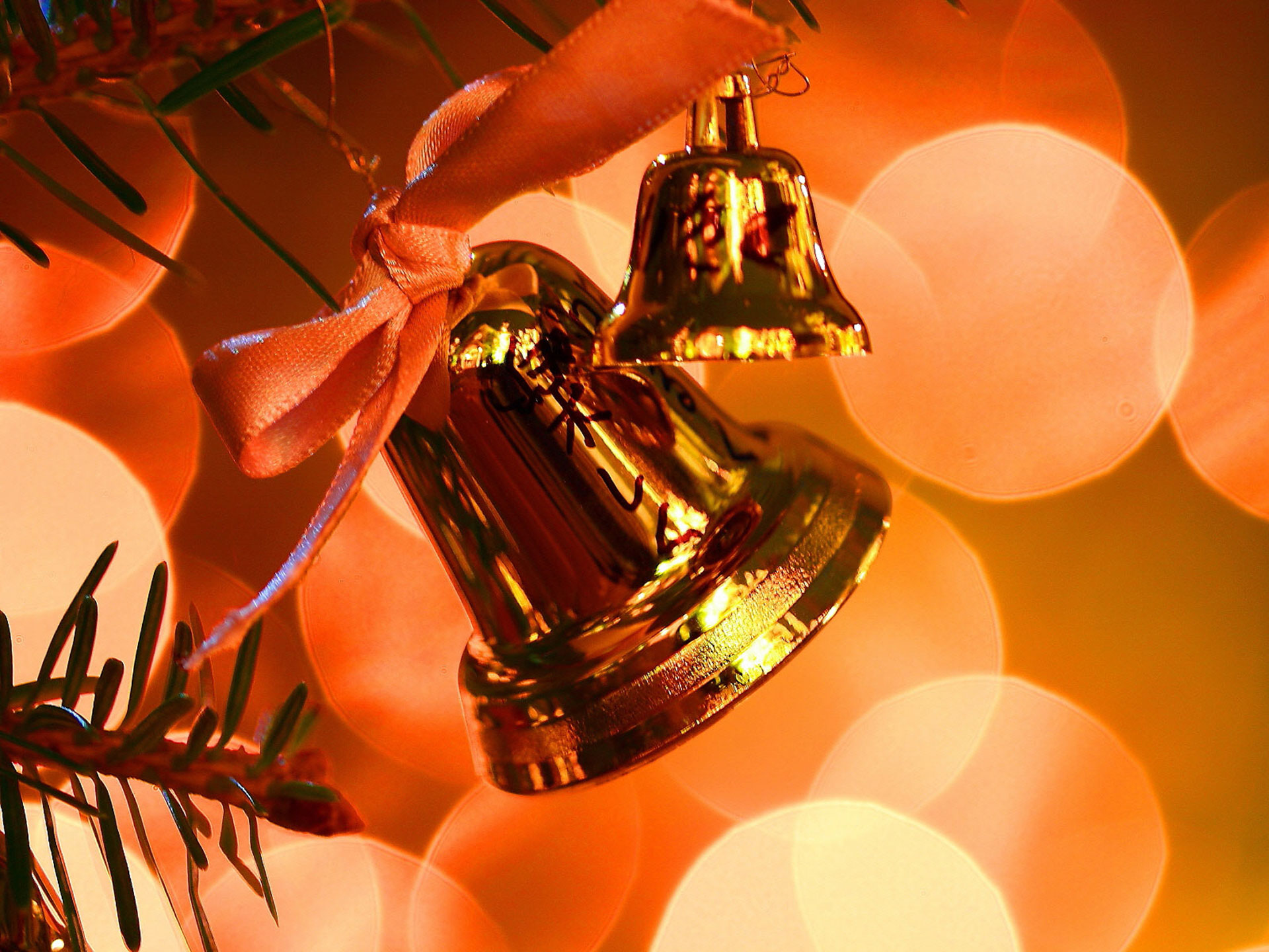 Christmas ornaments with bells on a beautiful HD desktop wallpaper