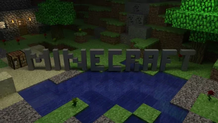 HD desktop wallpaper featuring the Mojang video game Minecraft, with the game's logo constructed from in-game blocks beside a serene water scene.