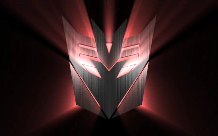 HD PC desktop wallpaper featuring the glowing red Decepticon logo from the Transformers movie against a dark background with radiant light effects.