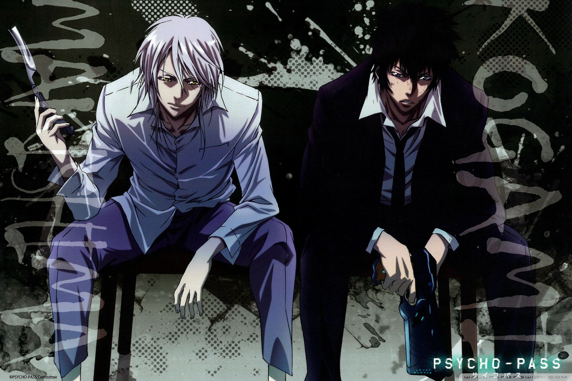 HD PC desktop wallpaper showing anime Psycho-Pass characters Shougo Makishima (white-haired, cigarette) and Shinya Kogami (dark-haired, holding Dominator), seated against a grungy backdrop.