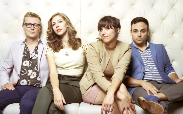 HD desktop wallpaper featuring Lake Street Dive band members sitting against a white tufted backdrop.