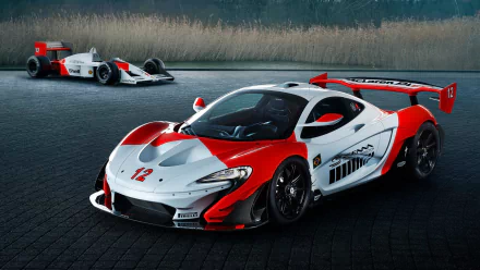 A McLaren P1 GTR hypercar in red and white with racing decals, displayed in HD as a striking PC desktop wallpaper and background.