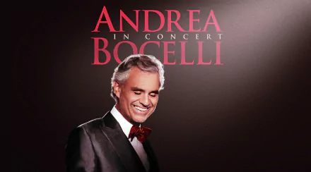 HD desktop wallpaper featuring the text Andrea in Concert Bocelli with an elegant man in a suit and a red bow tie on a dark background.
