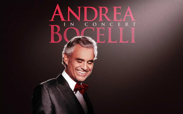 HD desktop wallpaper featuring the text Andrea in Concert Bocelli with an elegant man in a suit and a red bow tie on a dark background.