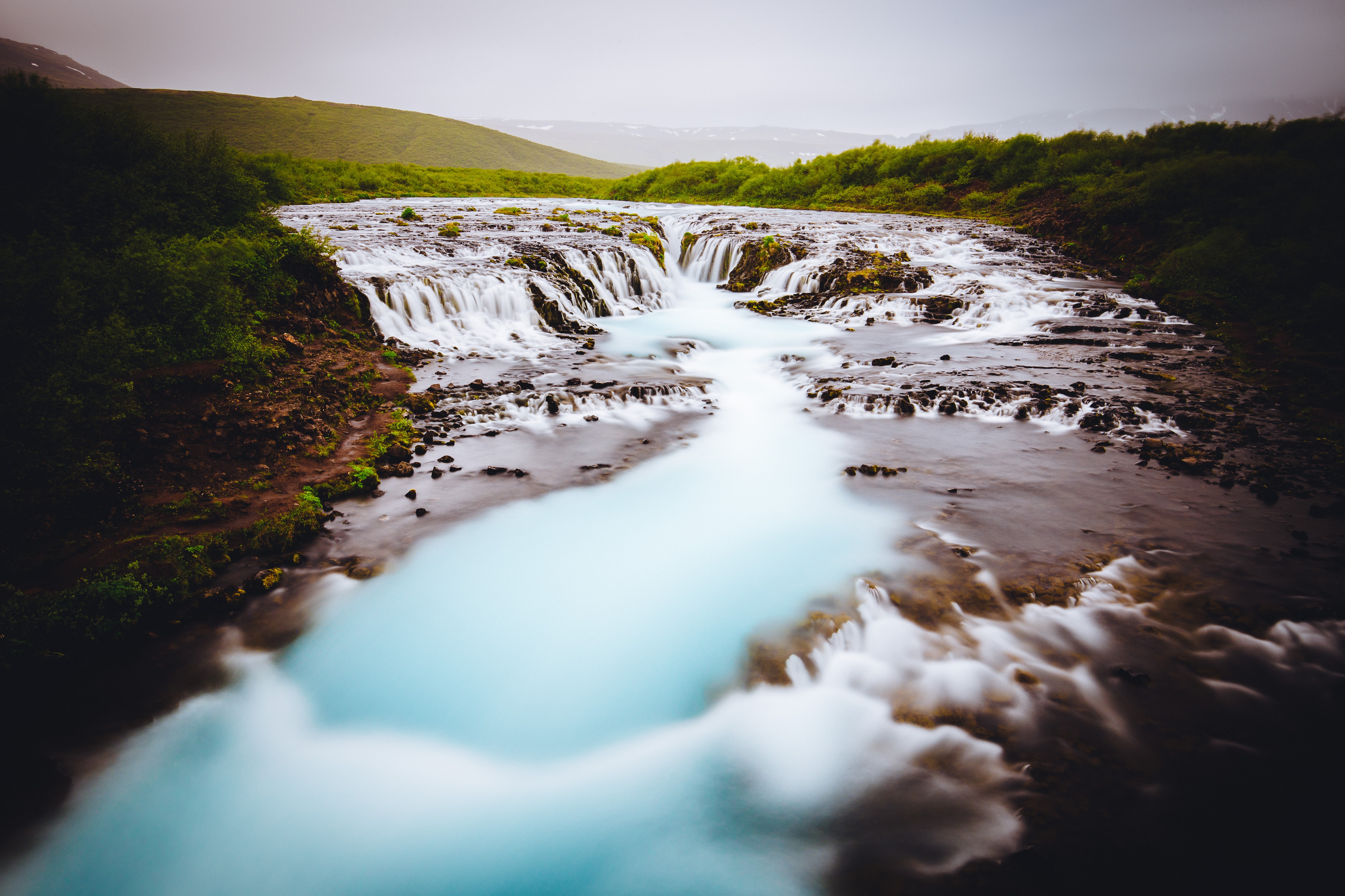 Long Exposure of Bruarfoss Waterfall,  Brekkuskógur, Iceland by Denys Nevozhai