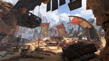 Apex Legends video game HD PC desktop wallpaper/background: sunlit rocky canyon arena with tattered sails, scattered wreckage and distant snowy peaks.