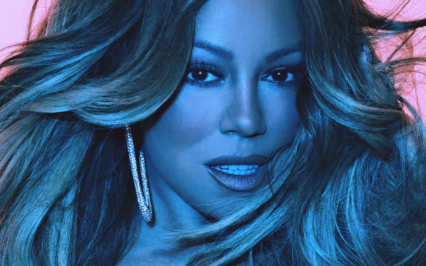 HD wallpaper featuring a striking portrait of Mariah Carey with a vibrant blue background.